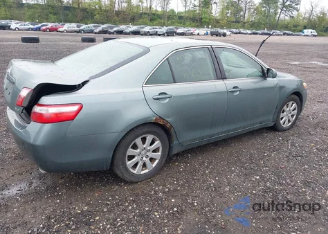 2007 Toyota Camry Xle z USA, uszkodzony, nr VIN JTNBE46KX73069941